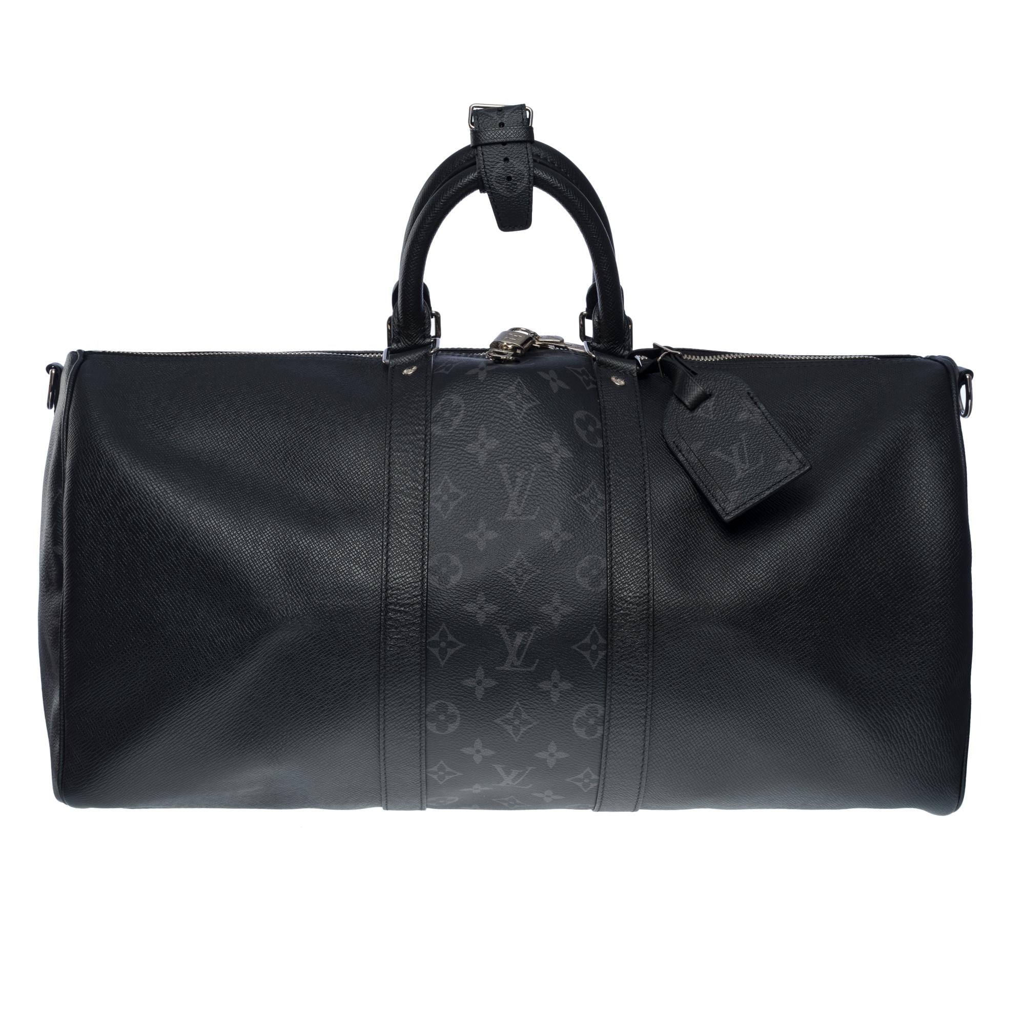 LOUIS VUITTON Keepall 50 Taigarama Travel bag in black canvas and leather , SHW