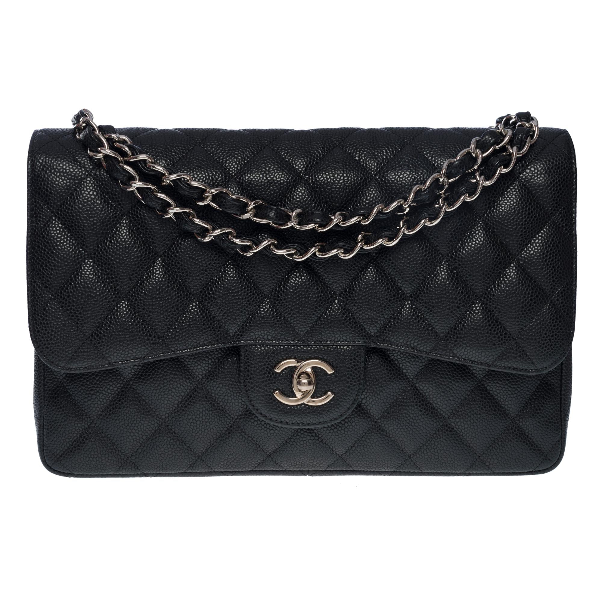 CHANEL Timeless Jumbo double flap bag in black quilted caviar leather, SHW