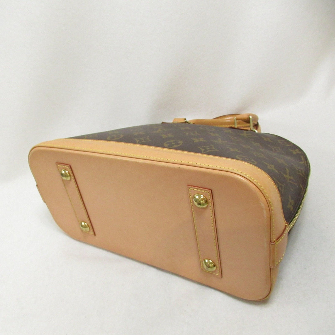 LOUIS VUITTON Alma Handbag