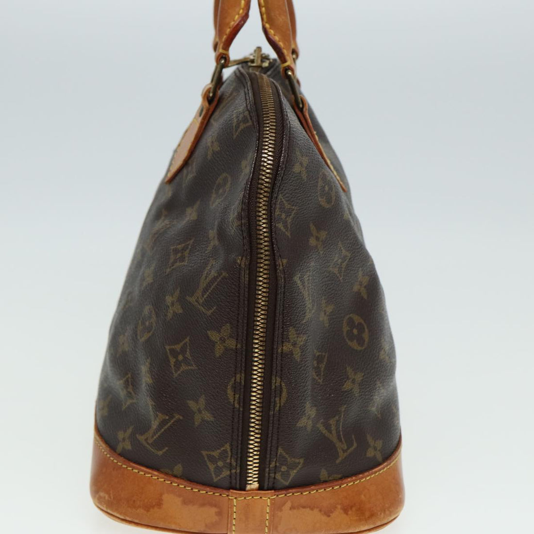 LOUIS VUITTON Alma Handbag