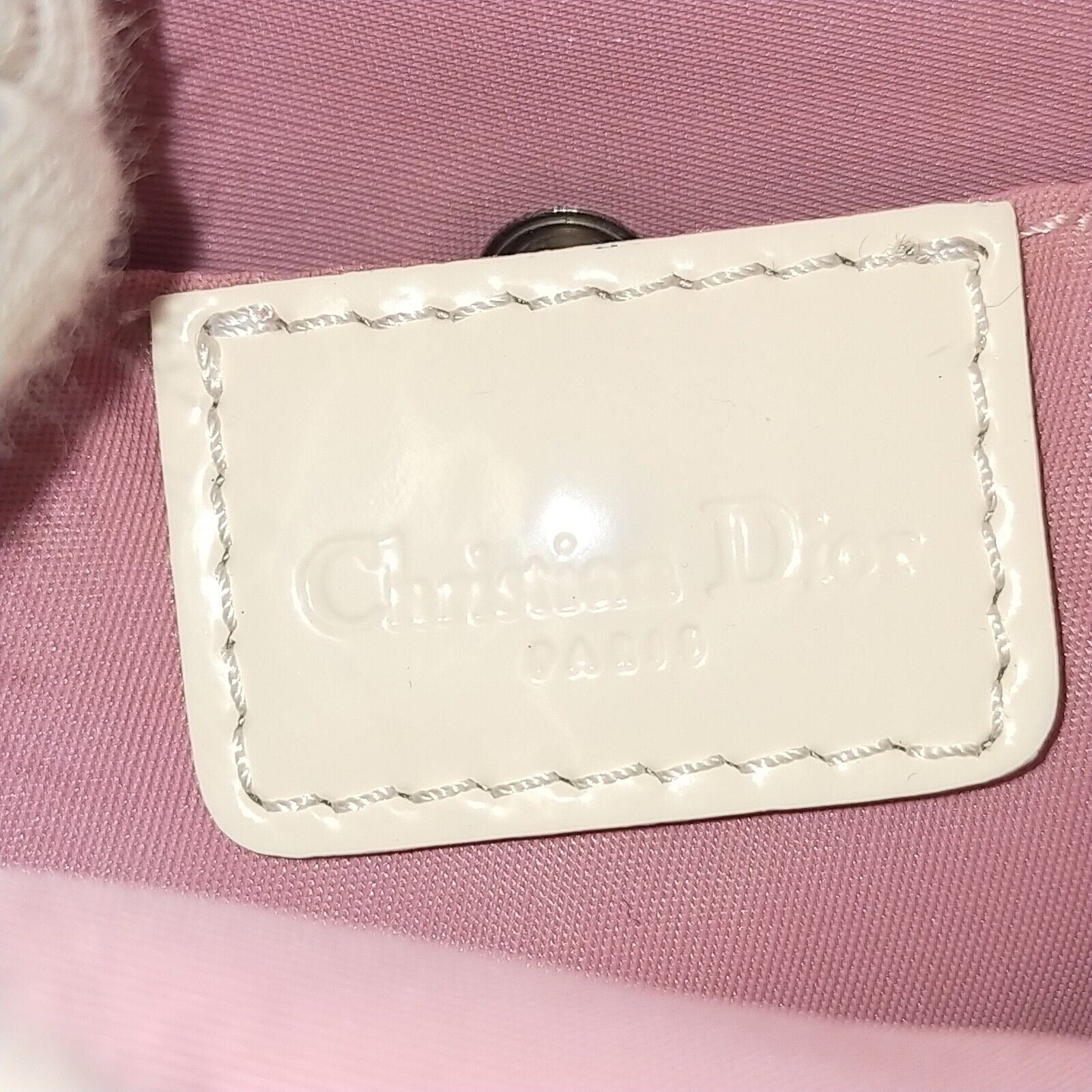 Christian Dior, pink and white trotter print canvas and white patent leather cross body with a structured, rectangular shape