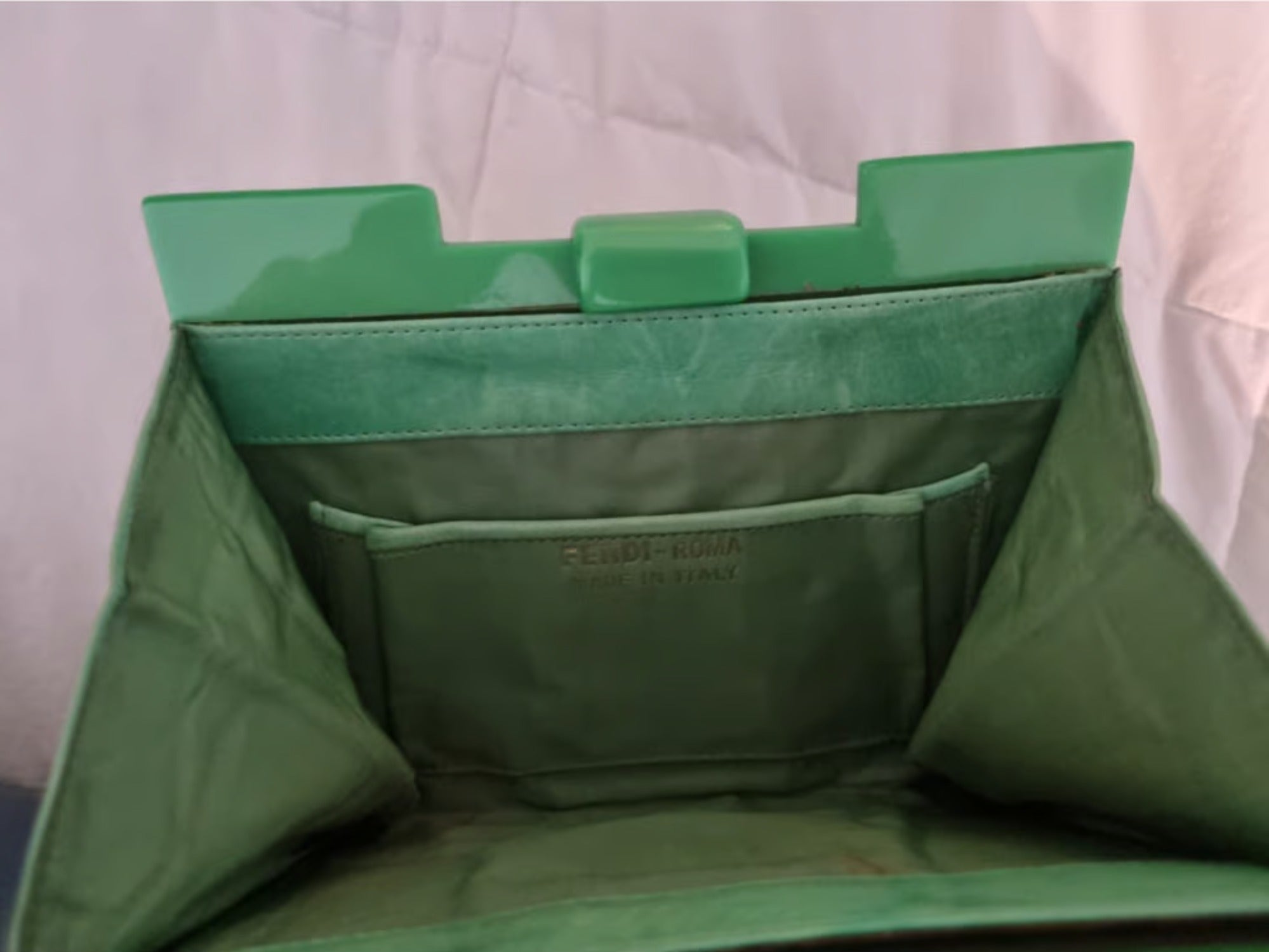 Vintage, Fendi green clutch style purse made of Lucite tiles and green leather with a latch top closure