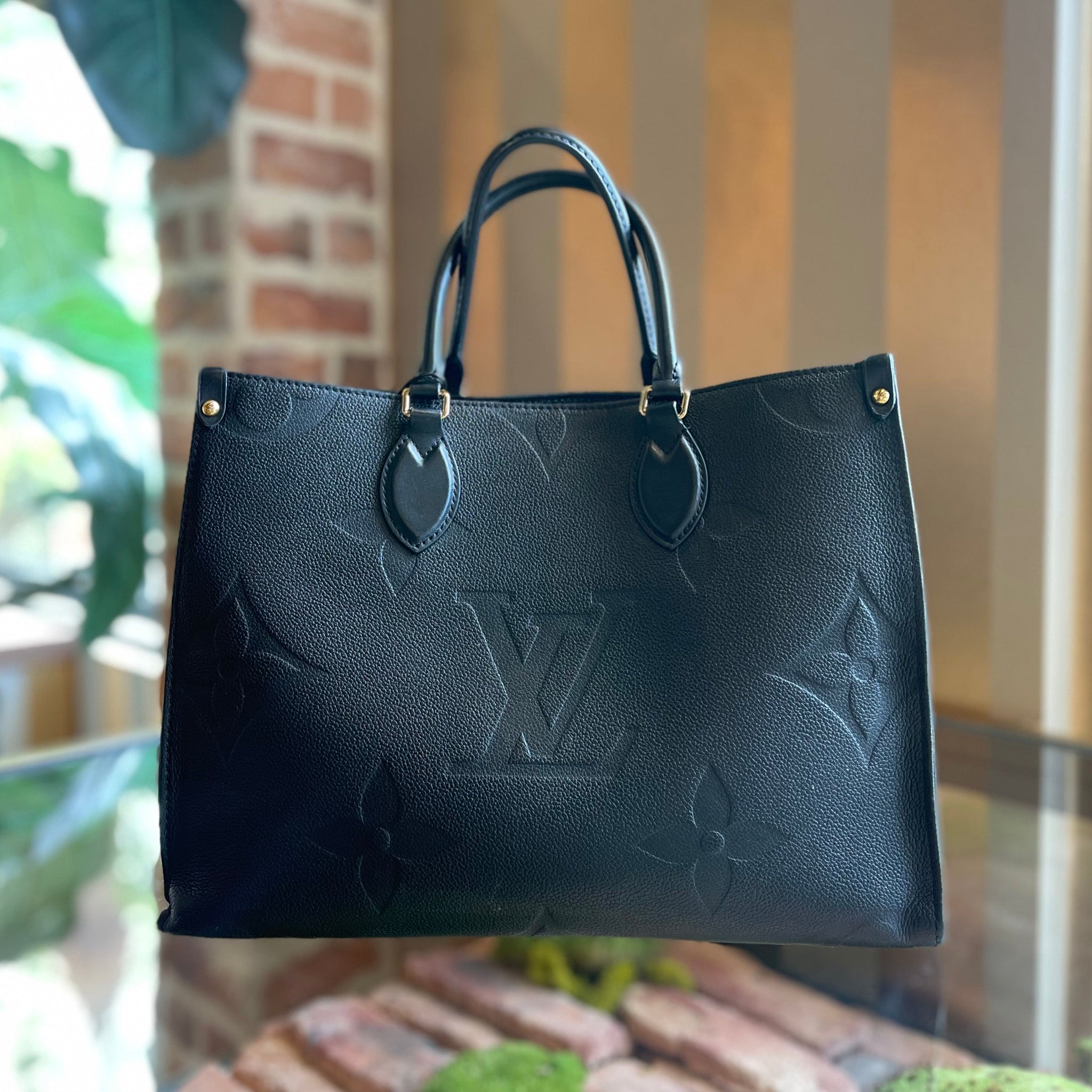 LOUIS VUITTON Onthego MM Black Empreinte Giant Monogram Tote Bag