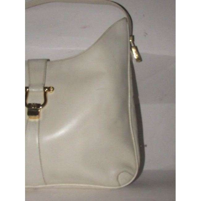 Early, Gucci, Jackie supple off-white colored leather XL hobo style shoulder bag with a gold horse-bit closure and accents, and two settings for the strap's length
