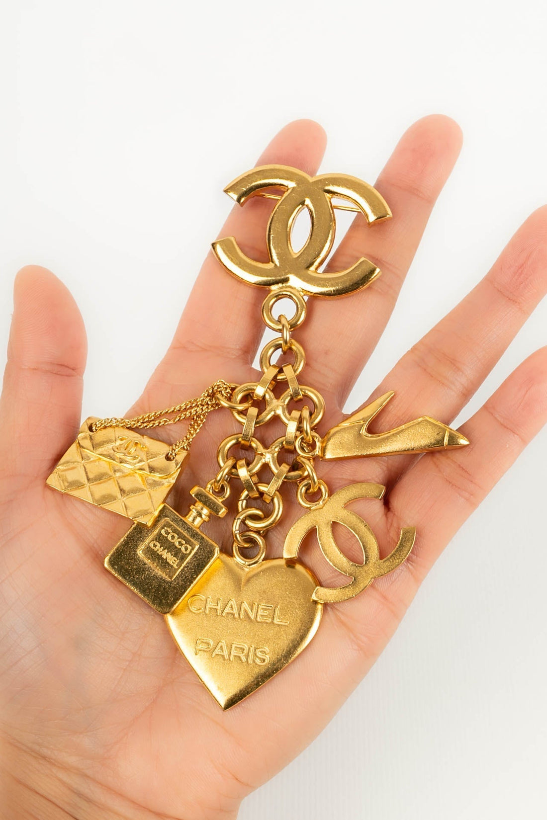 Broche charms Chanel 1995