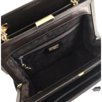 Gucci, unique, brown leather, large satchel style  shoulder bag with a snap hinged top, two longer gold chain & leather shoulder straps