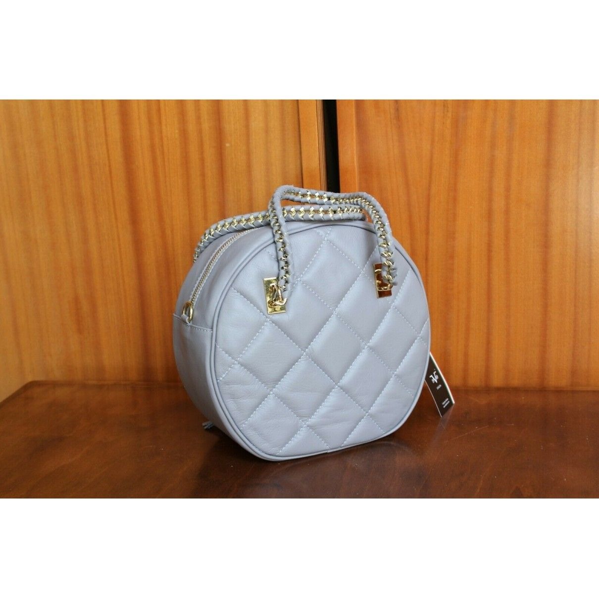 NWT, Versace, dove gray quilted leather, round, canteen style, satchel, shoulder or cross body bag with two chain and leather handles