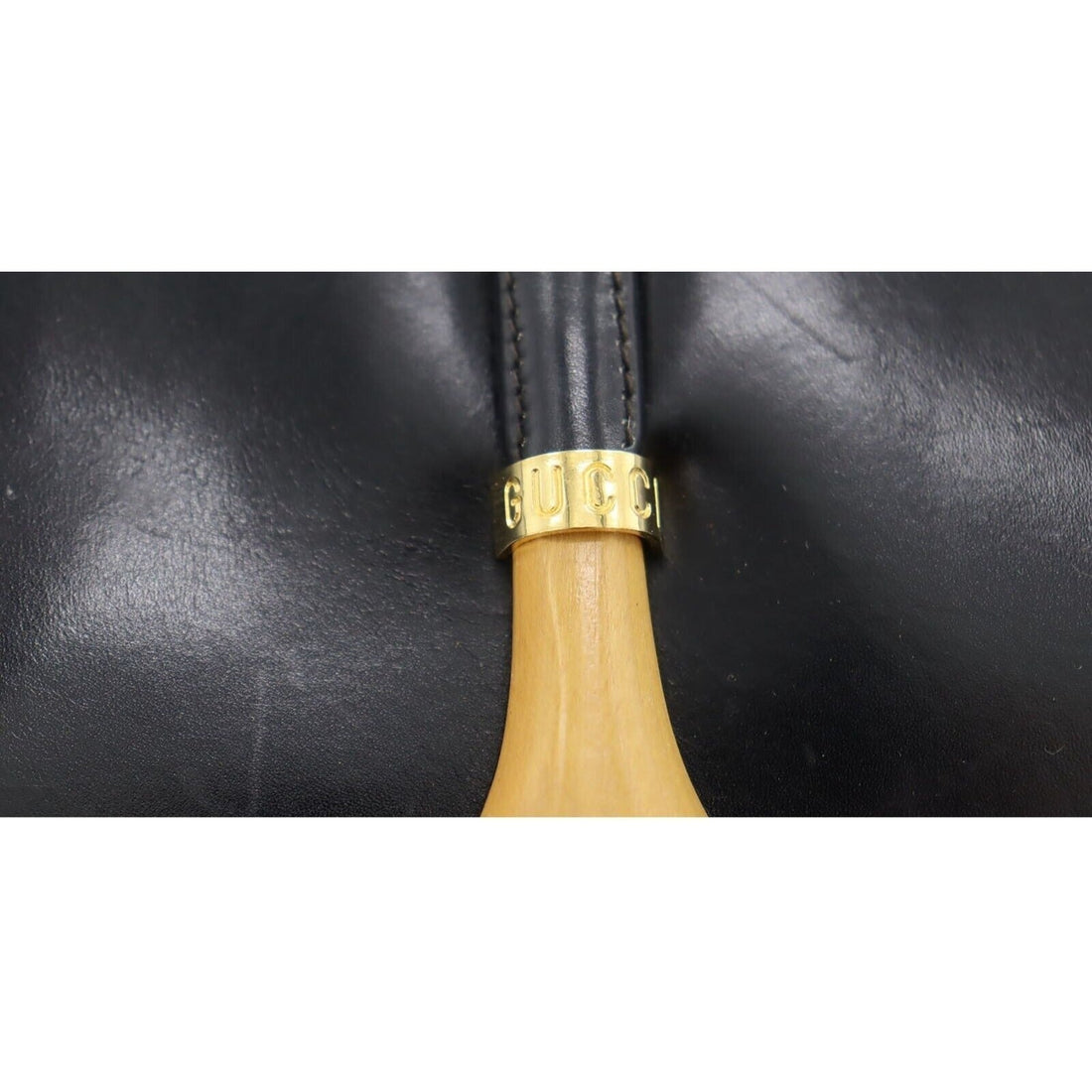 Vintage, navy leather, Gucci shoulder bag with XL gold & tan leather horsebit accent with cut-out & 'GUCCI' engraved on top