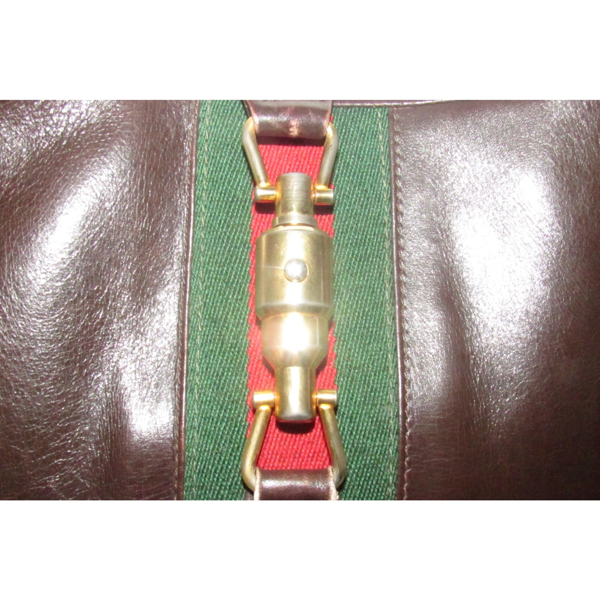 Rare, vintage, Gucci, 1961 Jackie, glossy brown leather hobo style shoulder bag with a red and green center stripe & gold piston closure