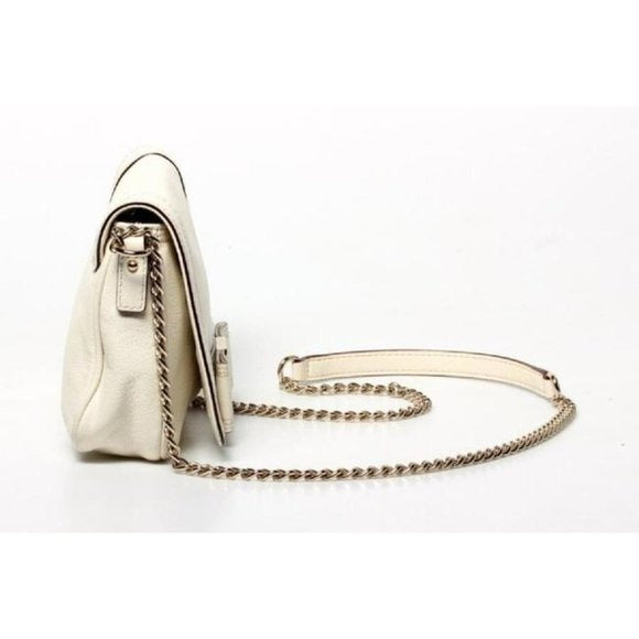 Kate Spade, classic, buttery soft white leather, rectangular, shoulder or cross body purse with an envelope snap top closure, leather bow accent, chrome hardware, and a chain and leather strap
