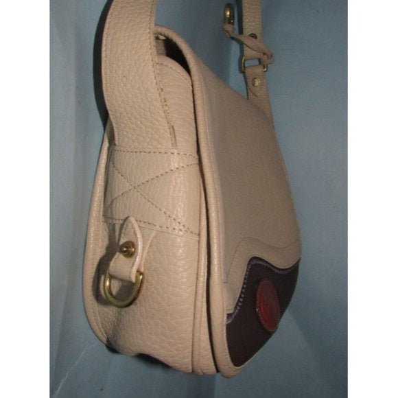Dooney and Bourke Vintage Brown Ivory Saddle Bag