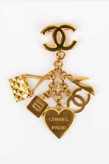 Broche charms Chanel 1995