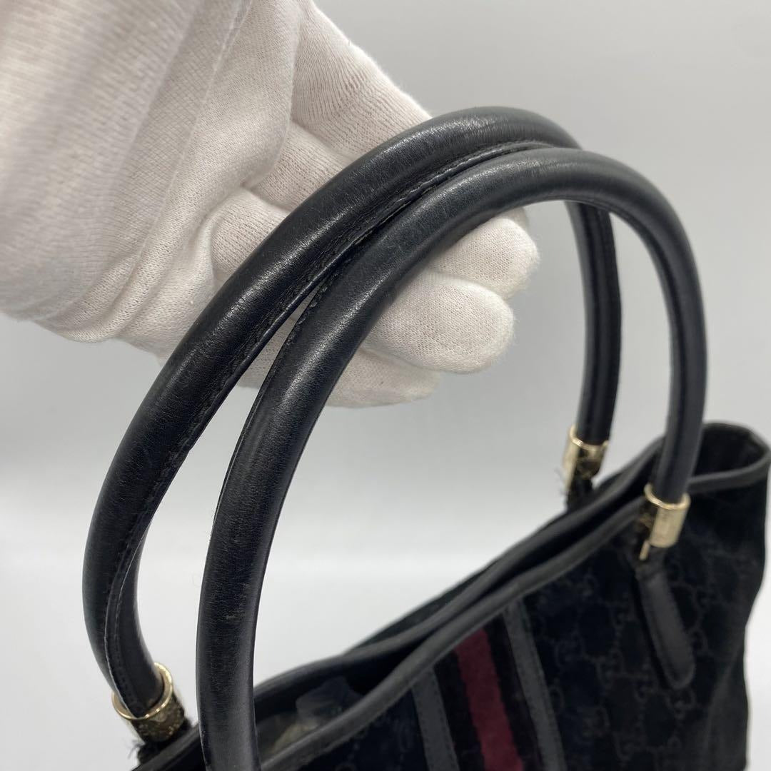 Gucci metallic G on black suede satchel w red & blue stripe