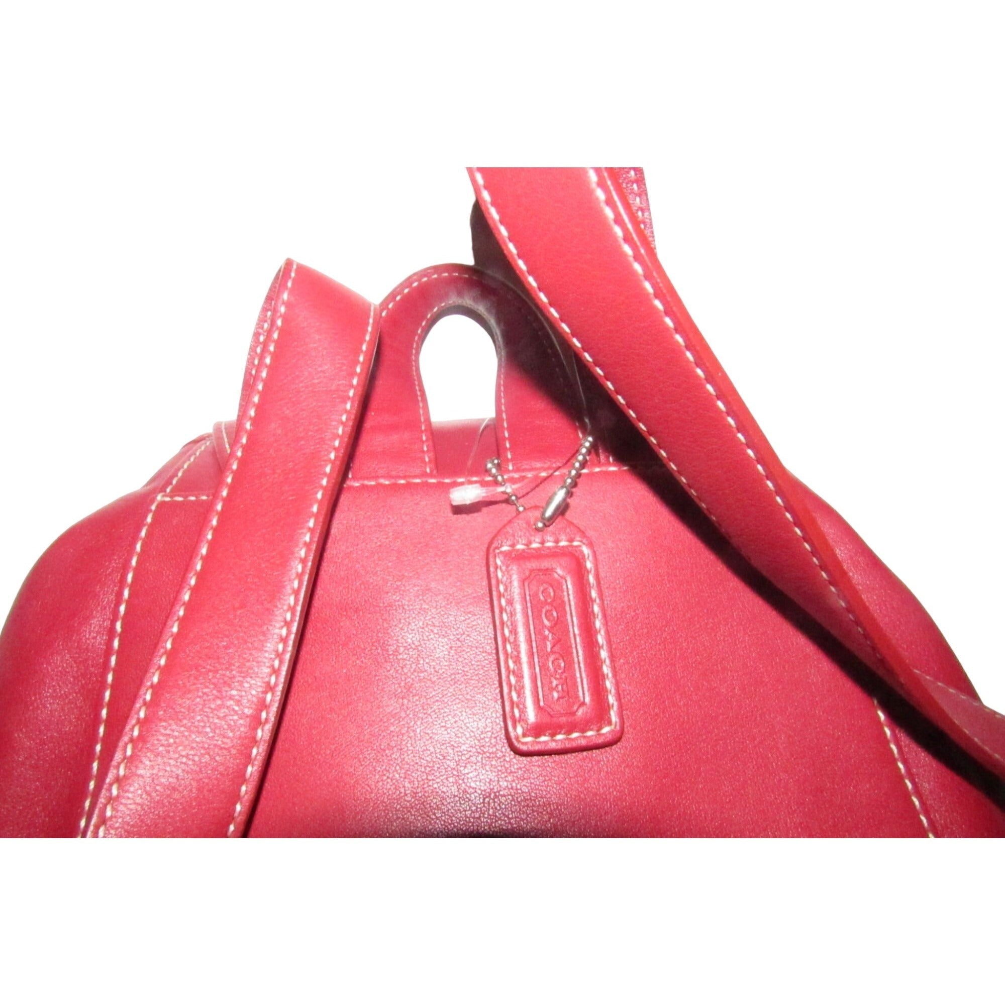 Coach, 'Legacy', large, sling style shoulder bag or backpack in buttery soft red leather with chrome accents and its Coach hangtag