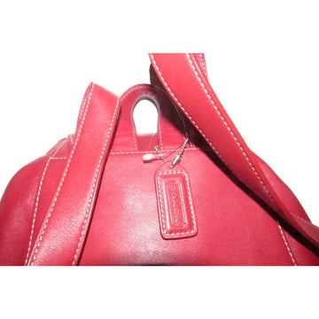 Coach, 'Legacy', large, sling style shoulder bag or backpack in buttery soft red leather with chrome accents and its Coach hangtag