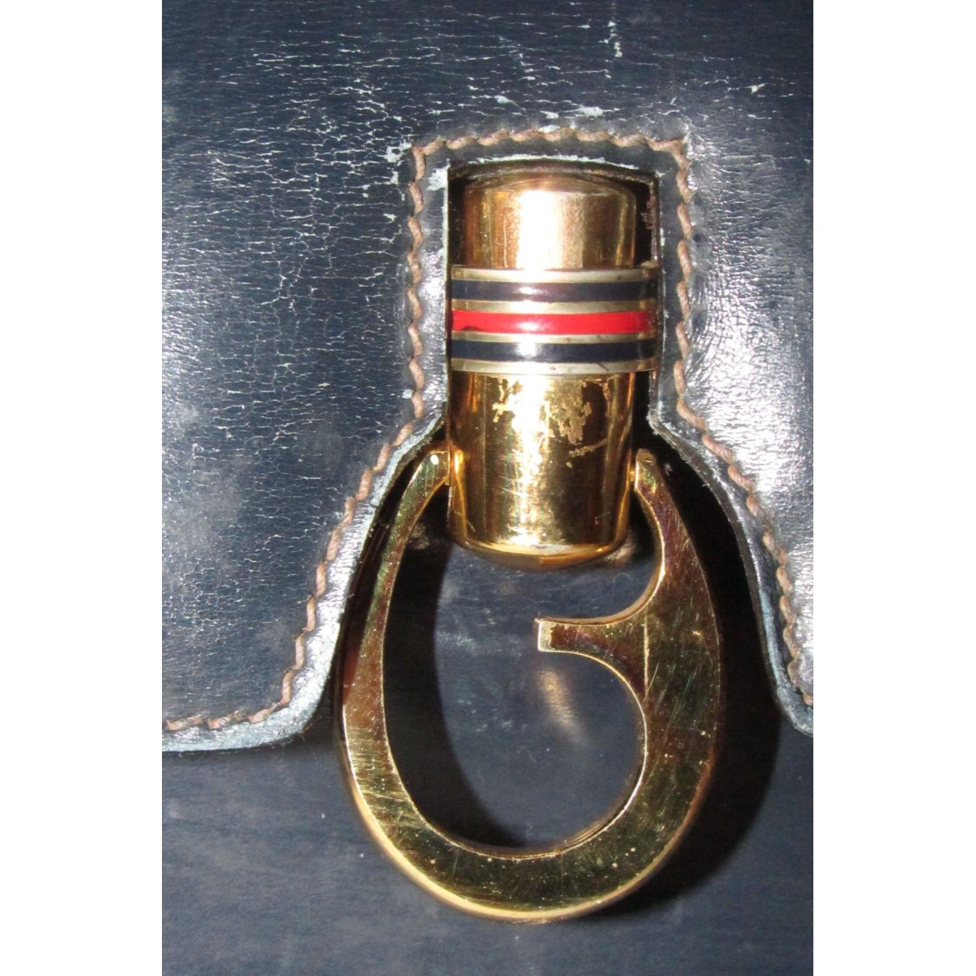 One of a kind, early Gucci, 1960's mod, hard and boxy, structured, navy leather, top handle shoulder bag with gold, equestri