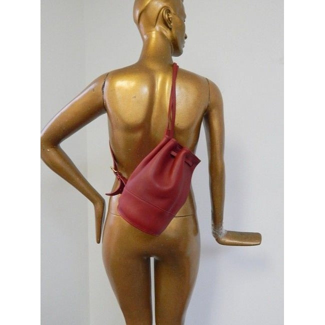 vintage, Coach, 'Bixby', large, drawstring top, bucket shaped, satchel style, sling style shoulder bag or backpack in buttery soft red leather with brass accents