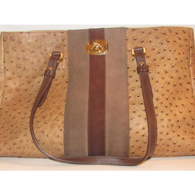 Furla, two handle, tote bag made of a fabulous, brown ostrich embossed leather and suede striped center in shades of burgundy