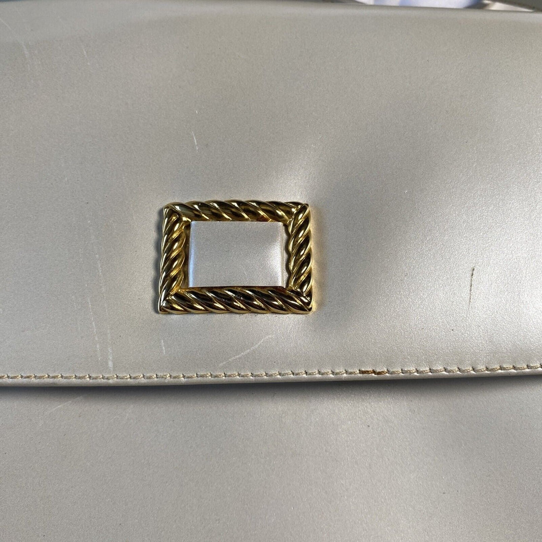 Ferragamo pearly/metallic leather purse w Gancini accent