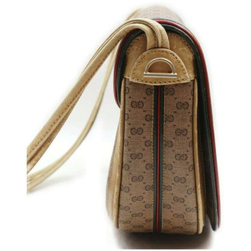 Gucci, rare, brown micro Guccissima print coated canvas/leather saddle bag with red and green inlaid leather stripes