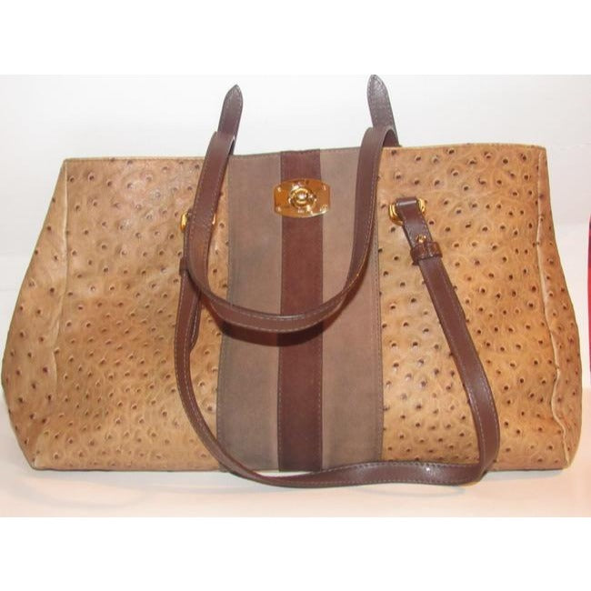 Furla, two handle, tote bag made of a fabulous, brown ostrich embossed leather and suede striped center in shades of burgundy