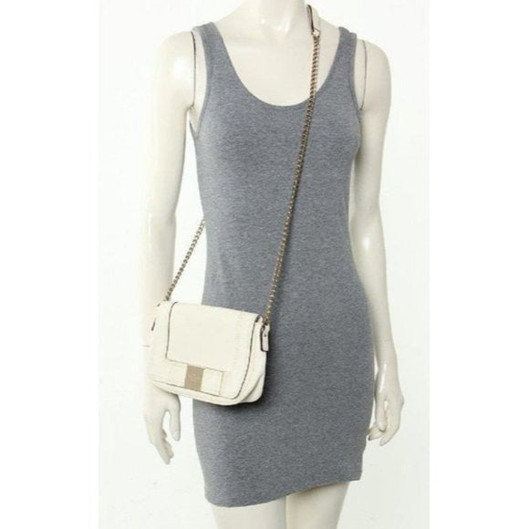 Kate Spade, classic, buttery soft white leather, rectangular, shoulder or cross body purse with an envelope snap top closure, leather bow accent, chrome hardware, and a chain and leather strap
