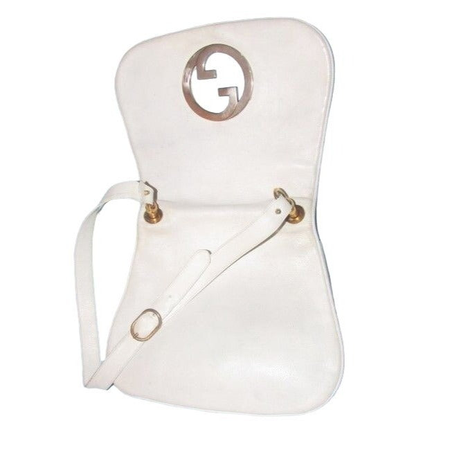 Vintage 1970s Gucci white textured leather Blondie style saddle bag with XL gold GG logo cutout in mint condition