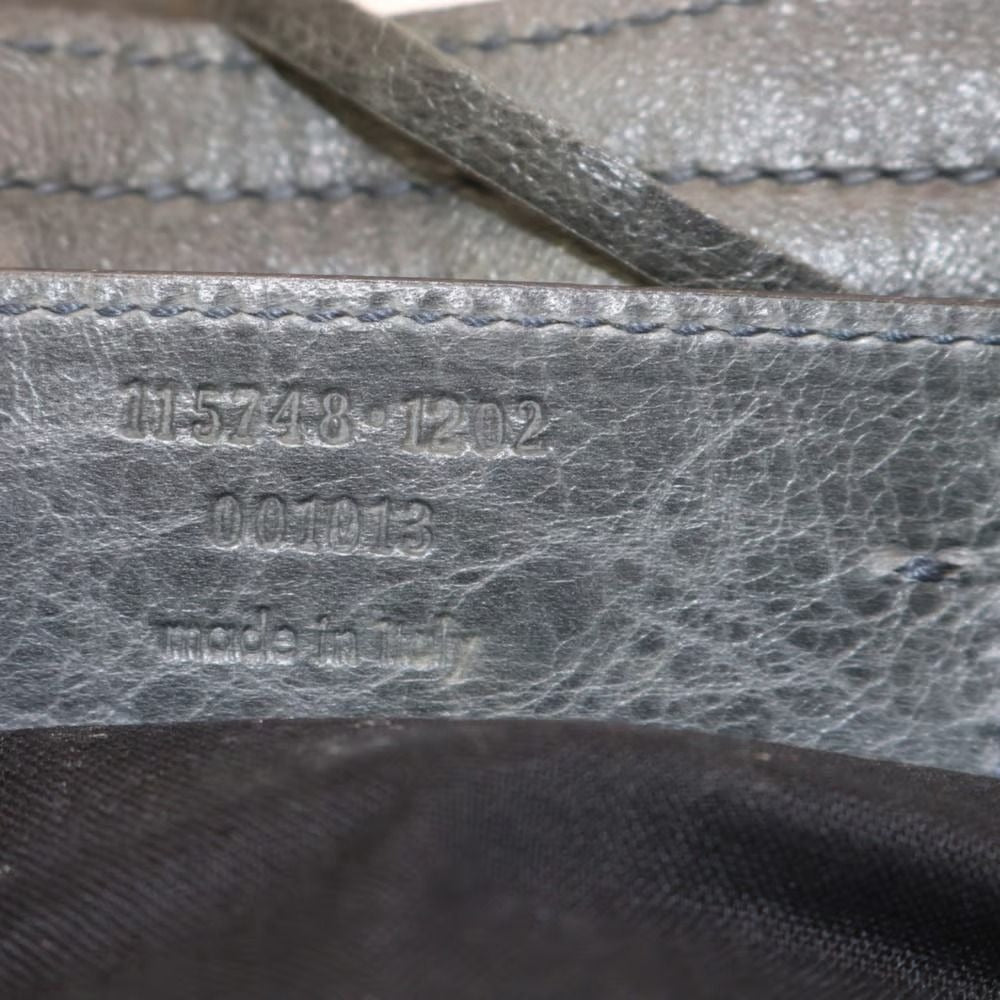 Balenciaga "City" style XL two-way satchel in pewter gray leather with gold hardware, fringe accents & a detachable shoulder strap