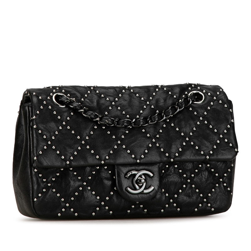 Chanel Medium Quilted Leather Studded Flap Bag Leather Shoulder Bag in Good condition