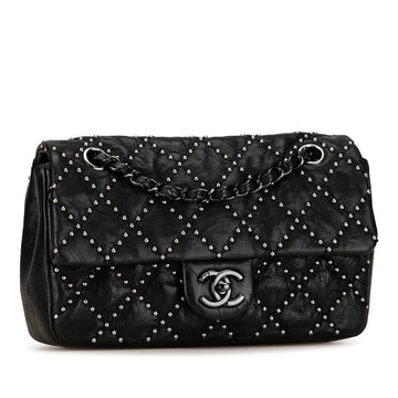 Chanel Medium Quilted Leather Studded Flap Bag Leather Shoulder Bag in Good condition