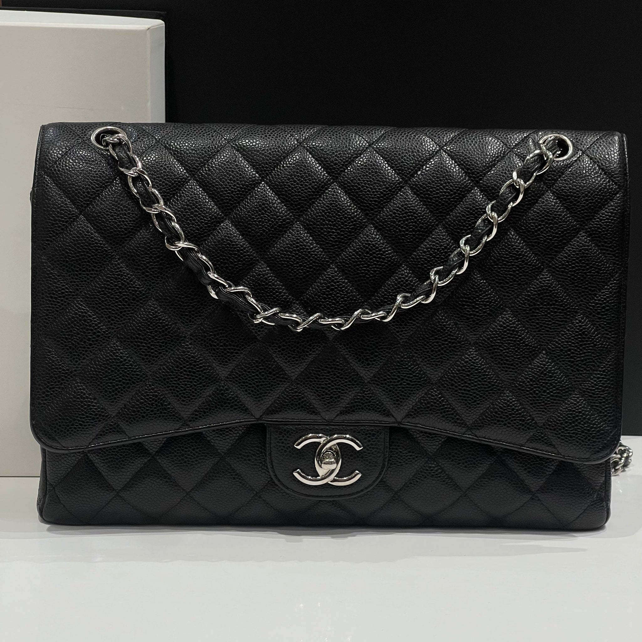 Chanel - sac classique maxi jumbo cuir caviar noir