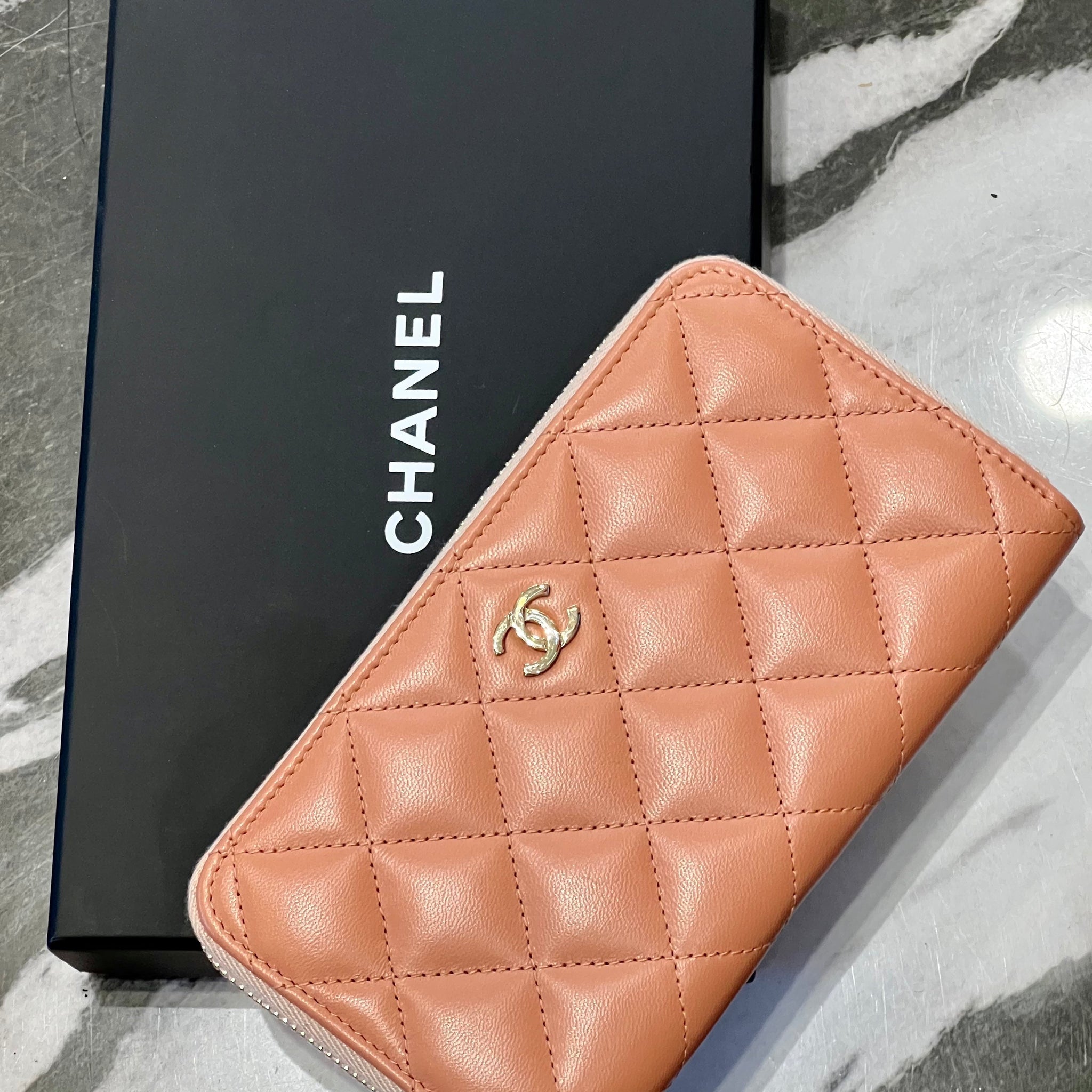 CHANEL QUILTED LAMBSKIN ZIPPY WALLET
