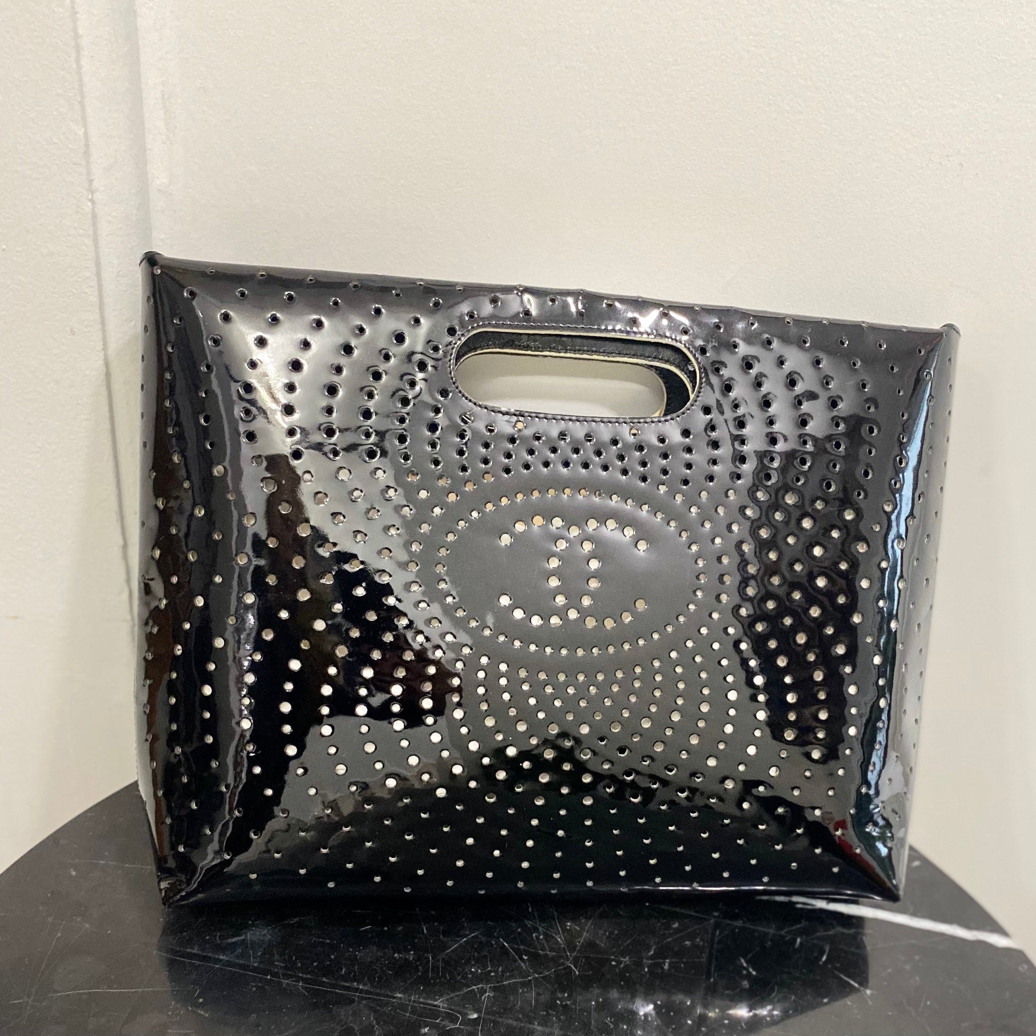 CHANEL CC PERFORATED PATENT CLUTCH BAG