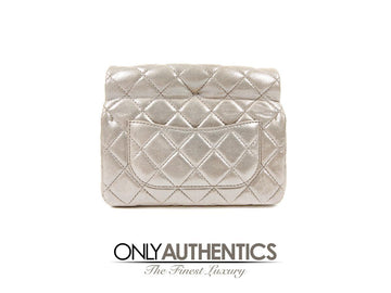 Chanel Silver Gold Leather Roll Handle Reissue Clutch