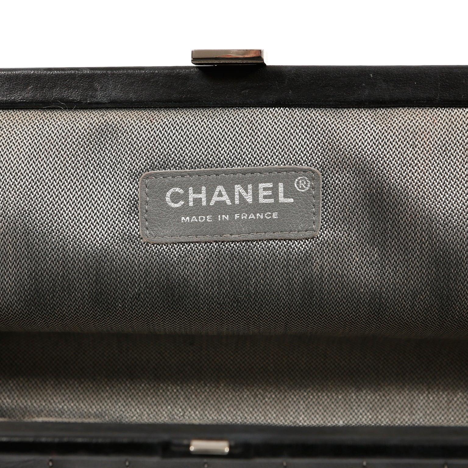Chanel Black Lambskin Vertical Stitch Clutch