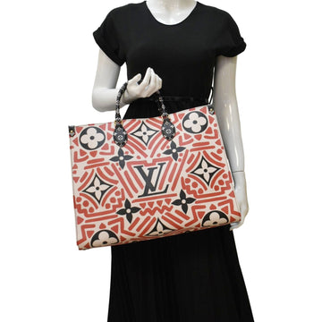 LOUIS VUITTON Onthego GM Crafty Monogram Giant Canvas Shoulder Bag Red