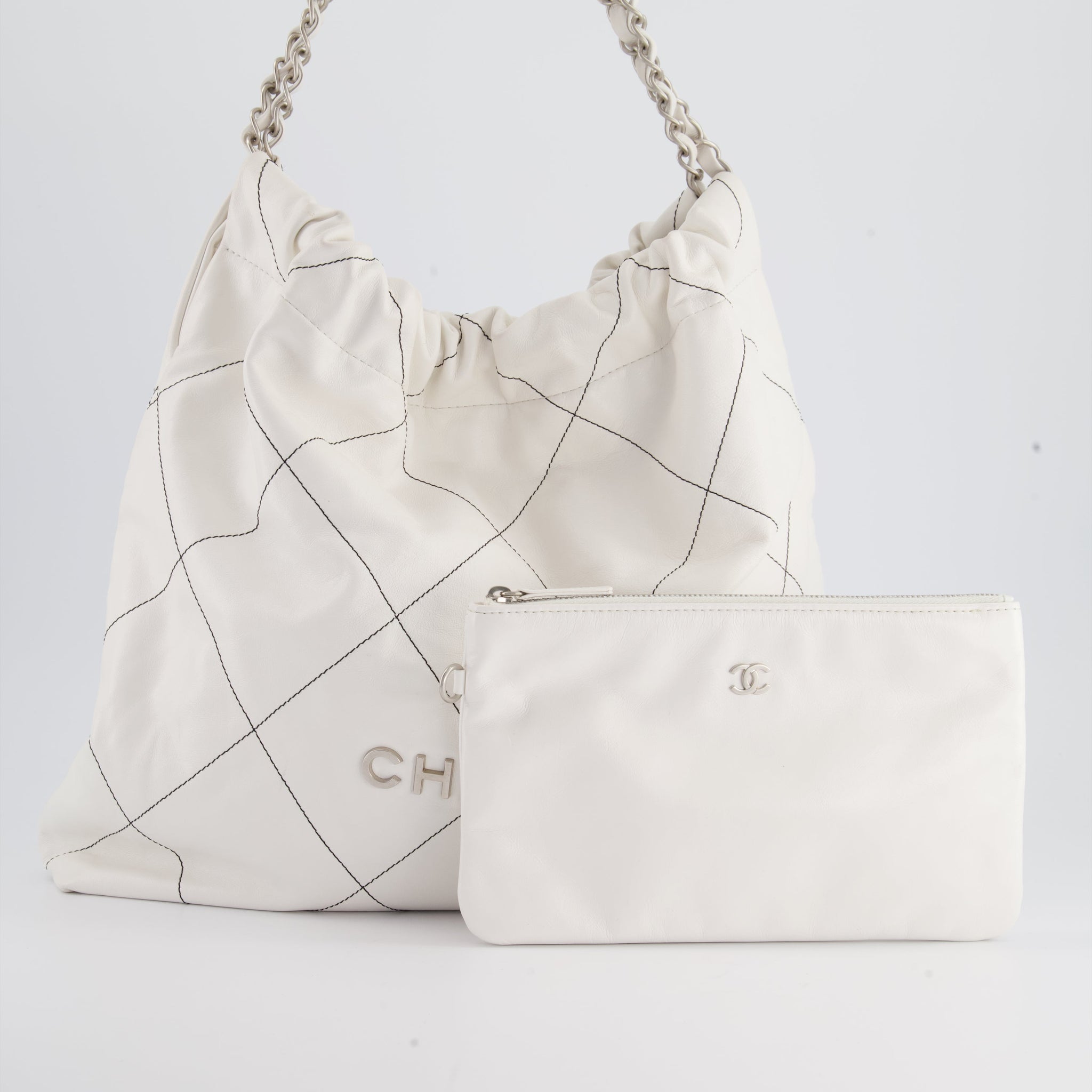 Chanel 22 Bag in White Aged Calfskin with Silver Hardware and Contrast Stitch Detail