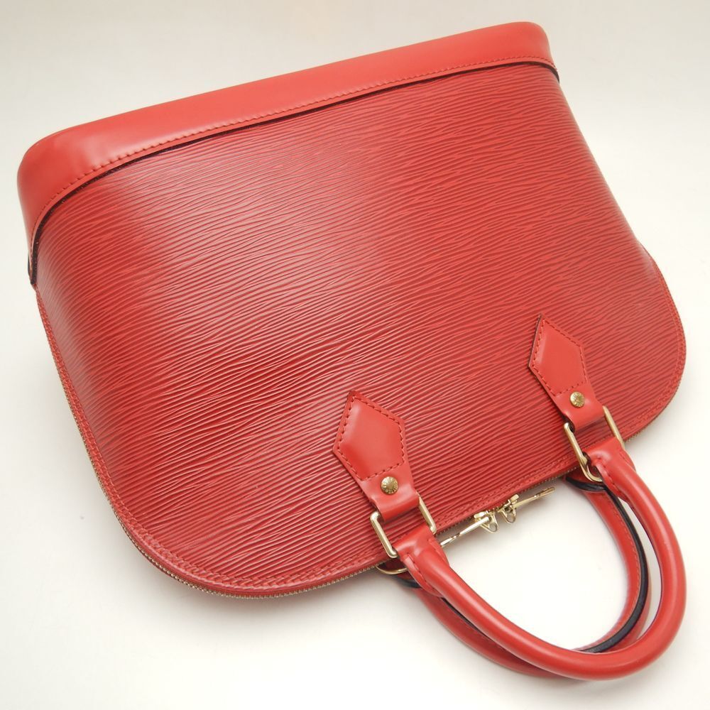 Louis Vuitton Epi Handbag Alma Castilian