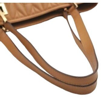 Gucci quilted camel leather, medium sized, two strap tote with bold chrome hardware