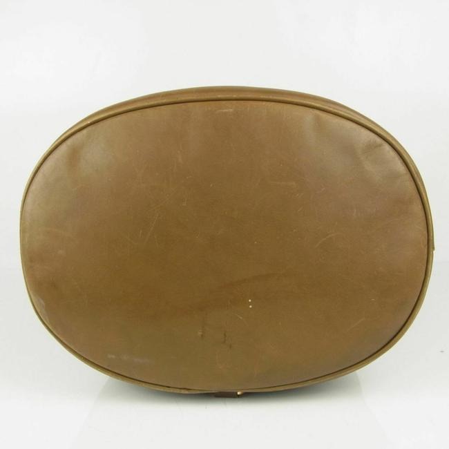 Amazing, Salvatore Ferragamo, RARE, olive green leather XL bucket bag or backpack with a gold Vara accent and a drawstring top closure