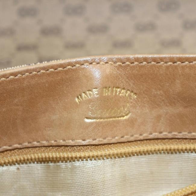 Gucci, rare, brown micro Guccissima print coated canvas/leather saddle bag with red and green inlaid leather stripes