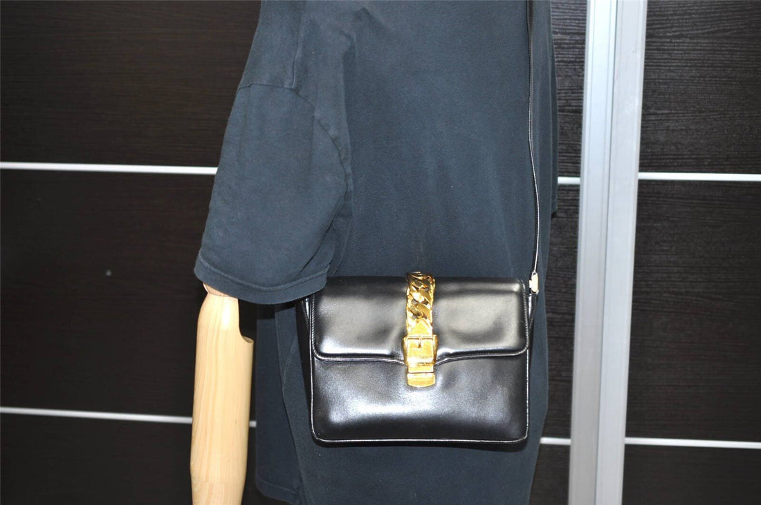 Gucci 1969 Sylvie  navy leather shoulder bag with a gold zipper accent