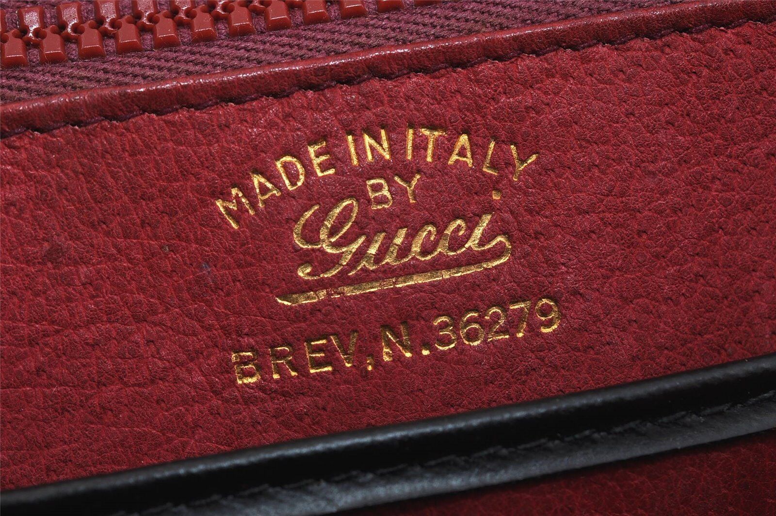 Gucci 1969 Sylvie  navy leather shoulder bag with a gold zipper accent