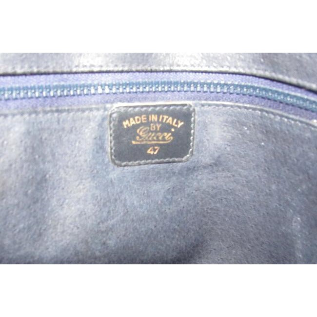 SALE! Vintage, Gucci, navy leather, shoulder bag with a zip top closure, front pocket, and a red and navy striped strap with gold horse-bit accents