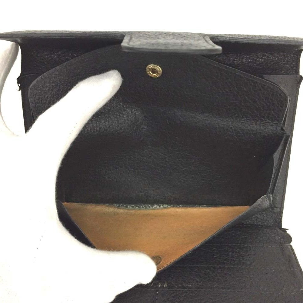 Unique, vintage, Gucci, RARE, black leather, clutch style purse or extra large wallet with a gold horse-bit accent at the clasp