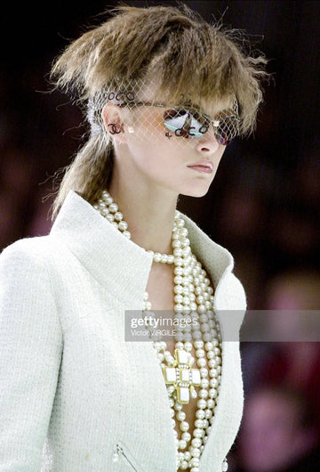 Collier croix Chanel