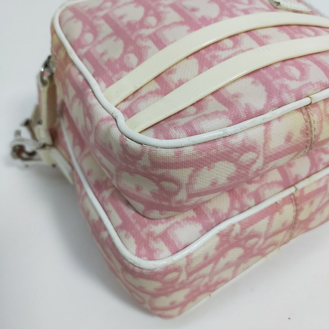 Christian Dior, pink and white trotter print canvas and white patent leather cross body with a structured, rectangular shape