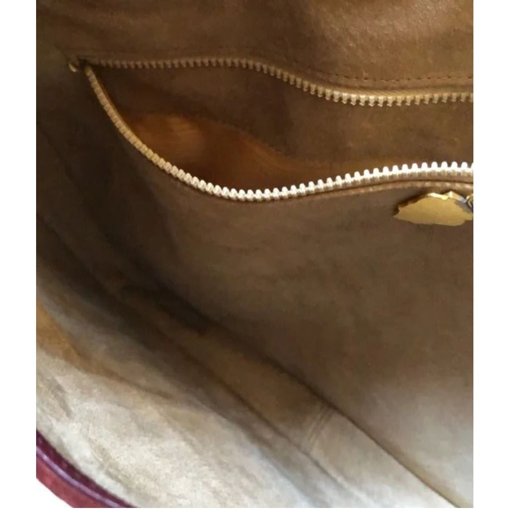 Rare, vintage, Gucci, burgundy leather & suede, unique, 1961 Jackie, hobo style shoulder bag with a two-tone piston closure & flap top