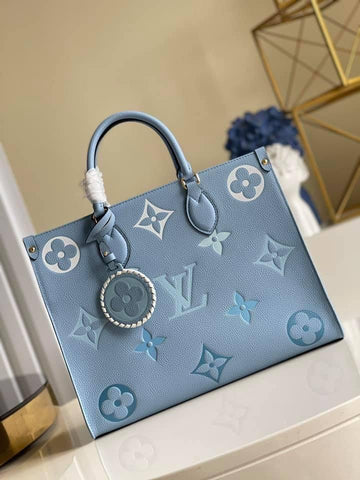 Louis Vuitton  MM Tote Bag