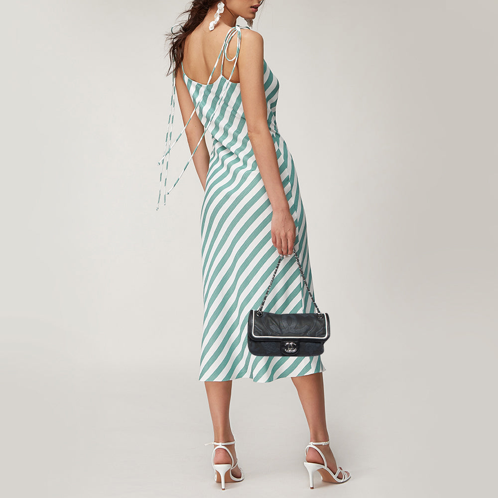 CHANEL Tri Color CC Logo Camellia Embossed Canvas and Leather East West Flap Bag